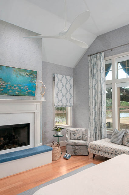 Main Bedroom with large window and fireplace